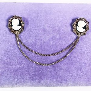 Black cameo victorian sweater clip brooches